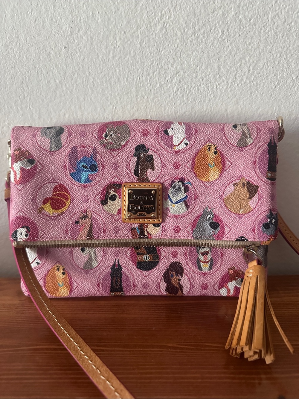 Dooney & Bourke Pink Disney Dogs Crossbody Clutch